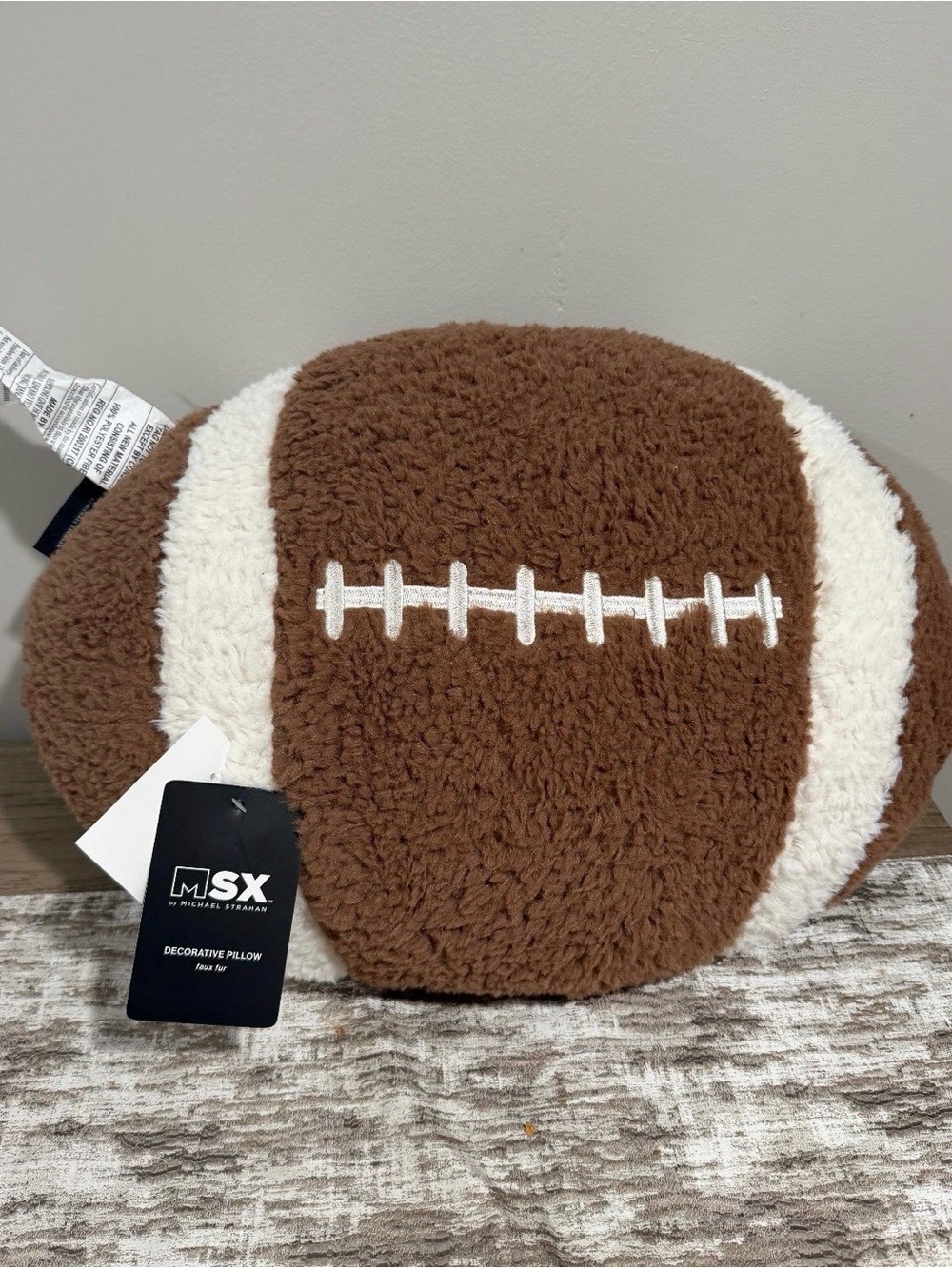 MSX Sherpa Football Accent Pillow in Brown and Cream